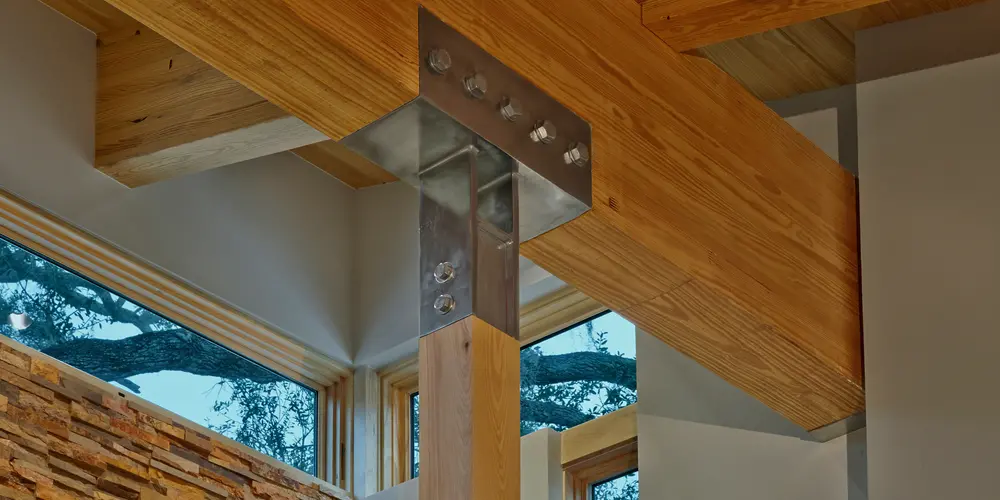 In this close-up examination of architectural craftsmanship, the essence of modern design is captured through the dynamic interplay between robust structural elements and natural materials.